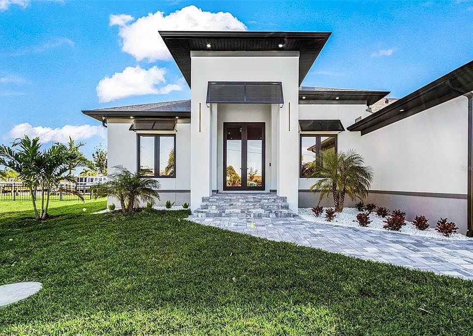 Front entrance and modern exterior of 10438 Atenia Street